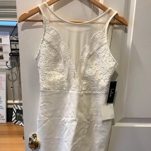 Mid-thigh cocktail dress, tags still on